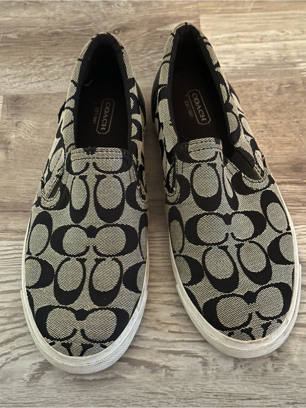 Coach Black and Cream Signature Slip-On Sneakers